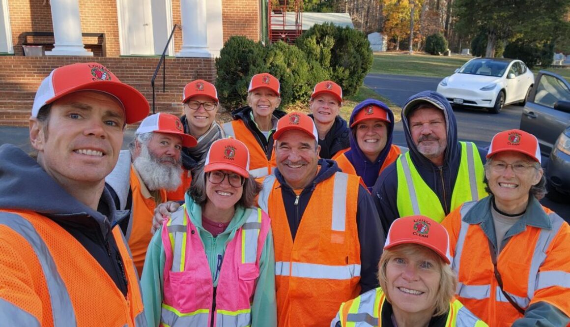 Group of men & women in safety vests cleaning up the roads near Lake Anna in Louisa County, VA