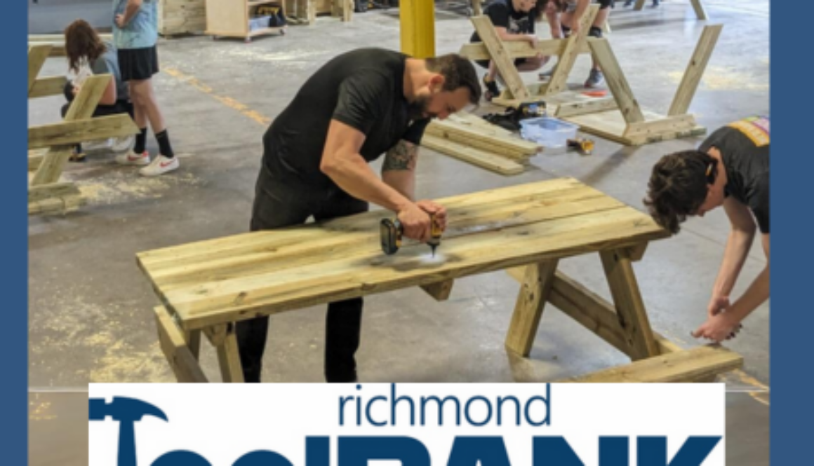 Man using power tools to build a picnic table