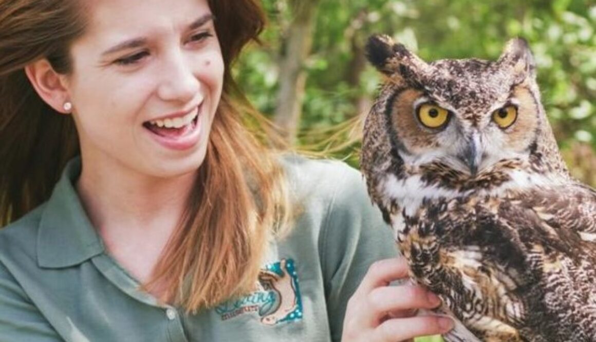 Girl holding owl