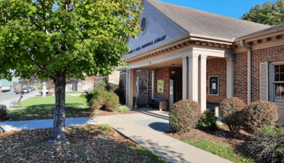 Photo of Jonnie B. Deel Memorial Library; red brick building with white columns